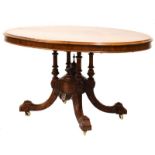 Victorian burr walnut oval loo table raised on four turned supports terminating in scroll feet,