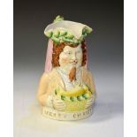 Late 19th Century Staffordshire Pottery character jug formed as a man carrying a game pie with the