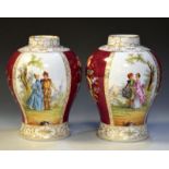 Pair of Continental porcelain baluster shaped vases decorated with panels of flowers and courtly