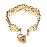 9ct gold fancy gate link bracelet with padlock, 13.1g approx
