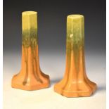 Pair of Ruskin hexagonal candlesticks having orange, green and yellow glaze, impressed mark to base,