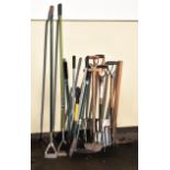 Assorted garden tools to include; electric strimmer, spades, forks, rakes etc