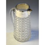 Victorian cut glass and silver mounted water jug, the rim with presentation inscription, London