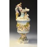 Italian porcelain ewer having Renaissance-style decoration of cherubs, the base unmarked, 39cm high