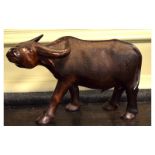 Large Oriental carved hardwood figure of a water buffalo, 49cm long x 32cm high