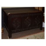 17th Century oak three panel coffer, the moulded two-plank hinged cover over lunette-carved frieze