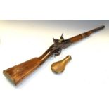 Early 19th Century French flintlock carbine rifle along with gunpowder flask, measures approximately