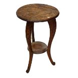 Oriental heavily carved hardwood circular two tier occasional table decorated with dragon, 44.5cm