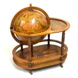 Late 20th Century stained beech and walnut finish globe design cocktail trolley having hinged