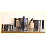 Trench Art - Silver-plated and Bakelite handled three piece tea set formed from spent shell cases