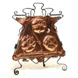 Arts & Crafts embossed copper and wrought iron fire screen, 71cm high