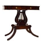 Reproduction Regency-style mahogany occasional table, the breakfront top over two drawers on lyre