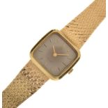 Marvin - Lady's 9ct gold 'Revue' wristwatch, rounded square dial with baton markers, to a flexible