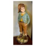 Early 20th Century painted plaster figure titled 'Coster Boy', 64cm high