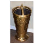 Dutch sheet brass stick or umbrella stand, of tapering circular form with repoussé decoration,