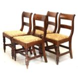 Set of four second quarter 19th Century mahogany dining chairs, each with figured bar back and