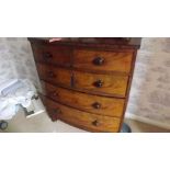 An antique bow fronted chest of 3 long a