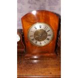 A large antique walnut dome top clock wi