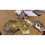 Three AA badges, one marked 0461008, the
