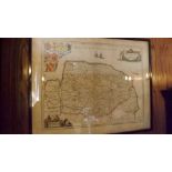 A framed coloured antique map depicting