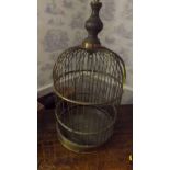 A Victorian dome top bird cage having tu