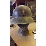A German helmet with Nazi Swastika lozen