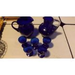 Two antique Cobolt blue jugs, one with c