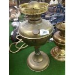 Two 20th century pedestal brass oil lamp