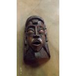 An unusual carved African tribal wooden
