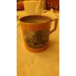 A Pratt ware pottery mug from the late 1