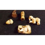 Five carved wooden miniature figurines/t