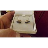 A pair of 9ct mounted blue sapphire ladi