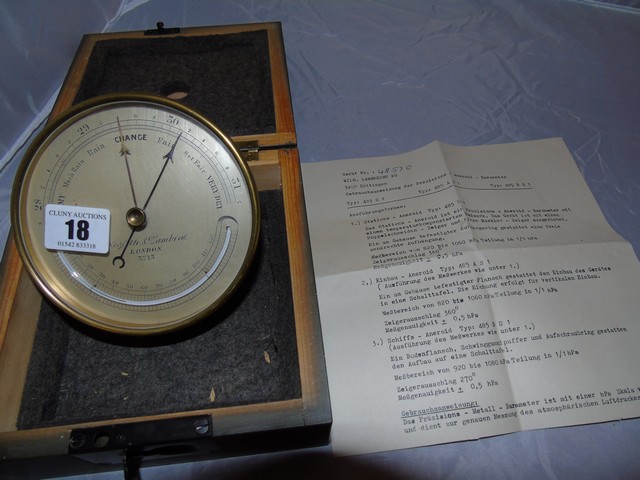 BRASS CASED ANEROID BAROMETER MADE BY NEGRETTI & ZAMBRA LONDON IN A GERMAN MILITARY BOX