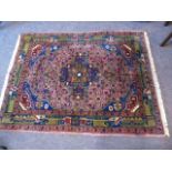 A MACHINE WOVEN RUG OF FAR EASTREN DESIGN 150CM X119cm EST [£25-£50]