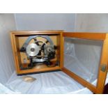 SMITHS ELECTRO MECHANICAL TIMER INSTRUMENT PRESENTED IN A GLASS FRONTED CASE EST [£80-£120]