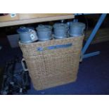 FOUR MILITARY METAL CONTAINERS IN A BASKET WEAVE CARRY CASE EST[£15-£30]