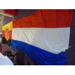 A COTTON DUTCH FLAG 3 X 2 M & A GERMAN PEOPLES ARMY NYLON FLAG 1960- 1990 280X 170M EST [£40-£60]