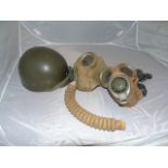 2 MOD GAS MASKS AND A PLASTIC REPRODUCTION HELMET EST[£12-£25]