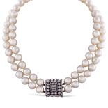 Two strands of cultured pearls necklace weight 106,6 gr.