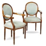 A pair of beechwood Louis XV armchairs