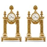 Pair of neoclassical style table pendulum clocks