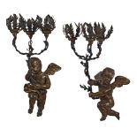 A pair of wooden putti