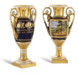 A pair of porcelain empire style vases