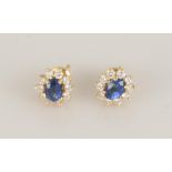Pair of 18K Gold, Sapphire and Diamond Earrings. Both marked 18K gold. Total weight 3 grams. Max