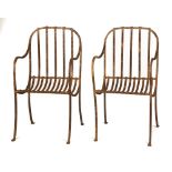 Pair of Wrought Iron Chairs. 19th century. Ht. 36 1/2" W 20" Seat Ht. 17". Online bidding available: