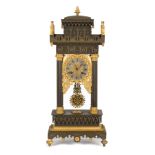 French Gothic Bronze Shelf Clock. Mid 19th century. Bronze and gilt bronze with silvered metal dial.