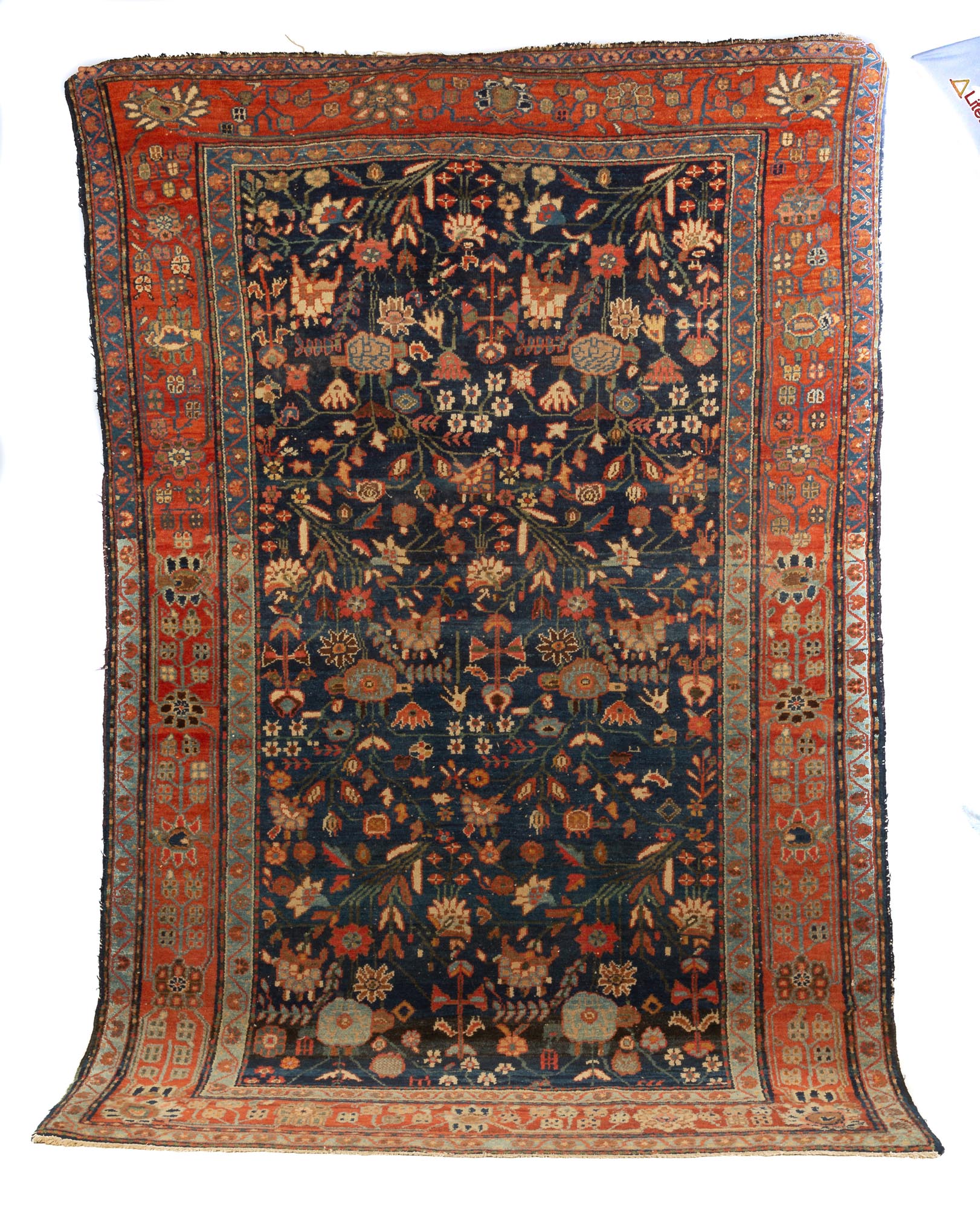 Malayar Oriental Rug. Some loss to end border. 6'2" x 4'1". Online bidding available: https://live.