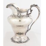 Dominick and Half Sterling Silver Water Pitcher. Repousse. Monogrammed. 36.5 ozt. Some surface