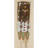 Native American Beaded Pipe Bag. Ht. 24 1/2" W 6 1/2". Online bidding available: https://live.