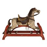 Carved & Painted Dapple Grey Rocking Horse. 19th century, with original seat and paint and unusual